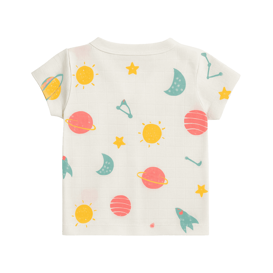 Back view of baby cotton shirt with colorful space print featuring planets, stars, moons, constellations, and rocket – short sleeve summer wear