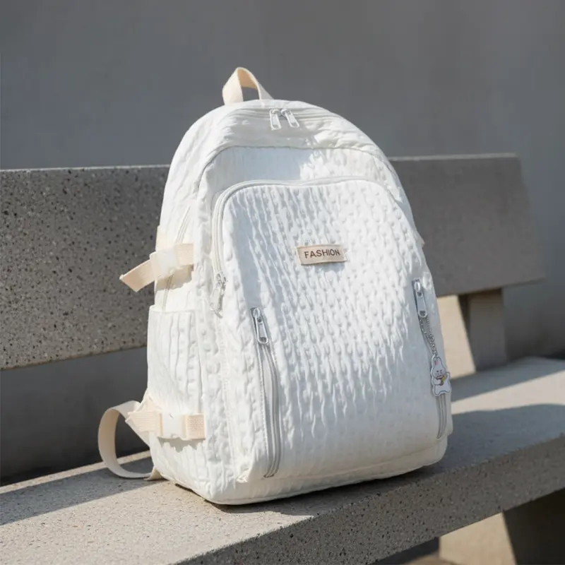 TORTKART Vibrant Purple Mini Backpack. Small fashion daypack or travel bag with a large front pocket, displayed against a colorful graffiti wall, perfect for street style and essentials.