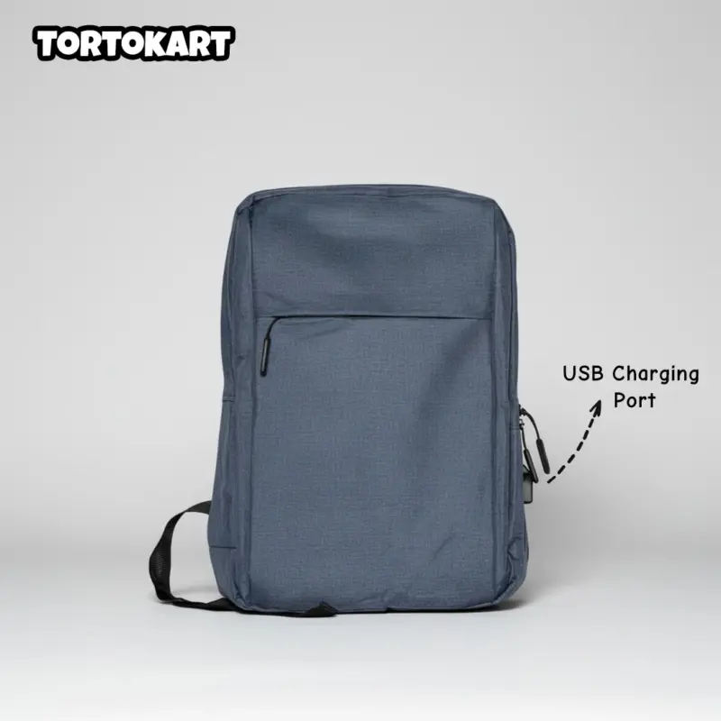 front view of a minimalist dark blue laptop backpack with a visible USB charging port on the side
