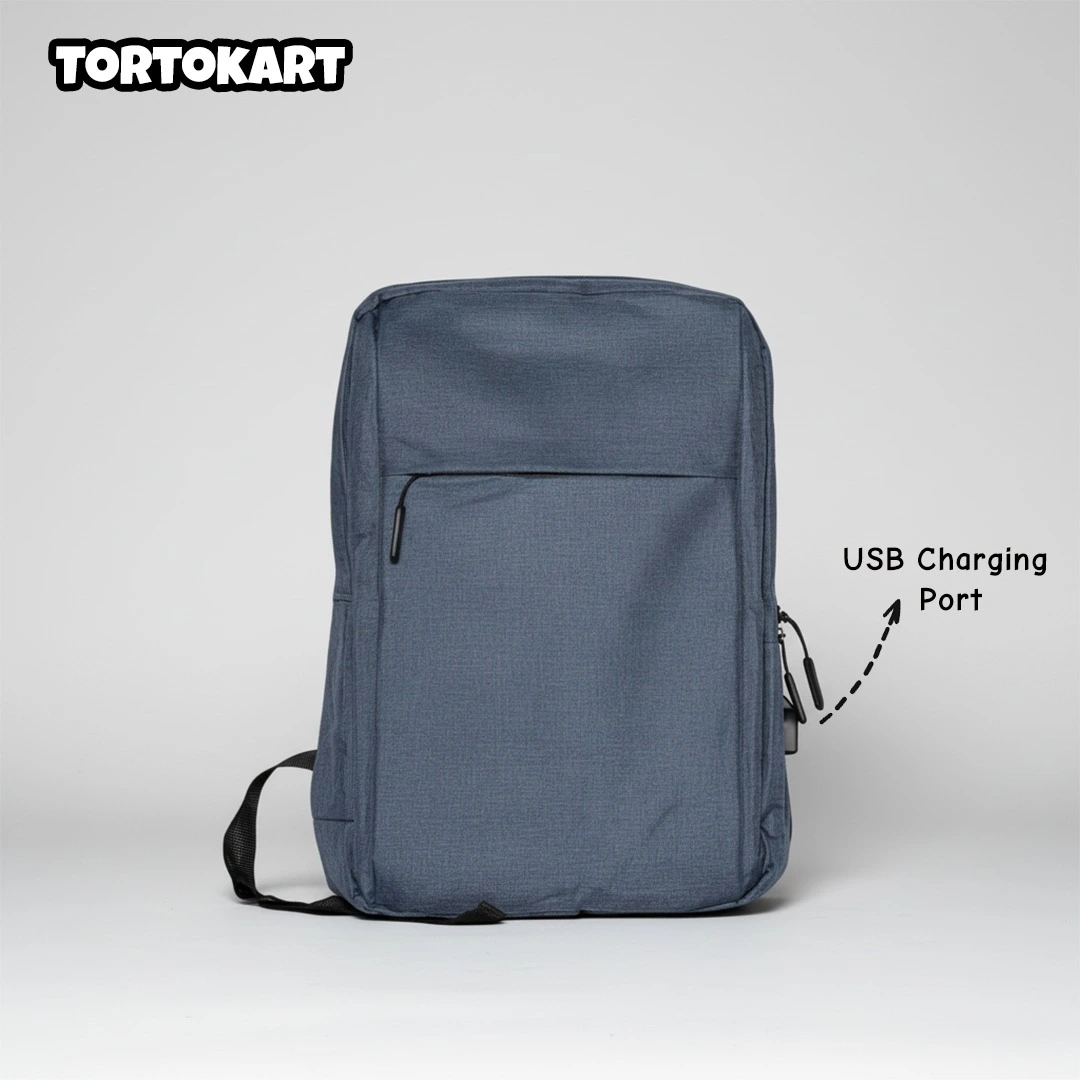 front view of a minimalist dark blue laptop backpack with a visible USB charging port on the side