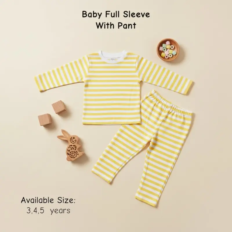 Yellow and white striped baby full-sleeve t-shirt and matching pants set laid out on a beige background with wooden blocks and a rabbit toy.