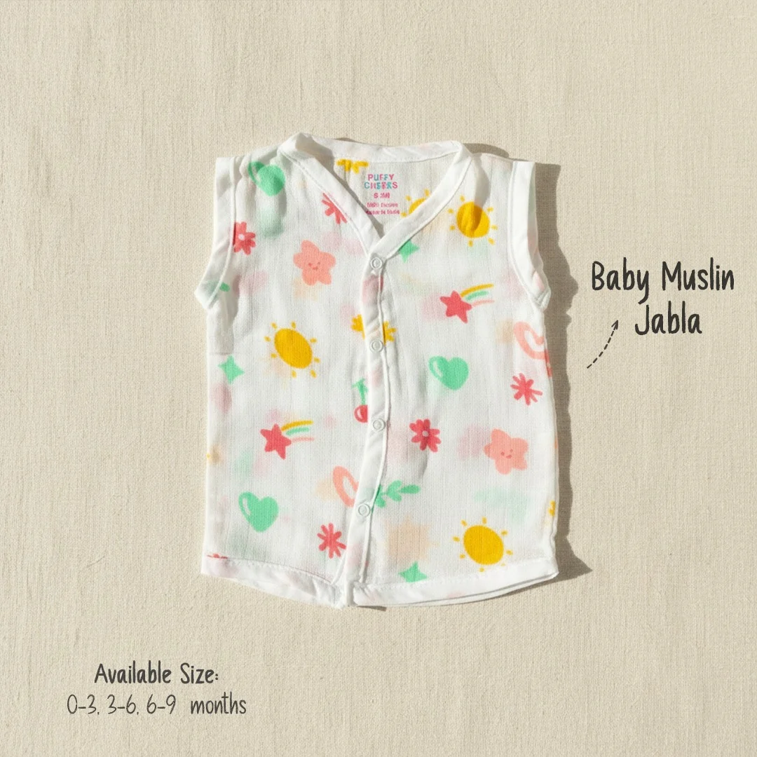 Puffy Cheeks infant muslin jabla sleeveless top with colorful sun, heart, and shooting star pattern.