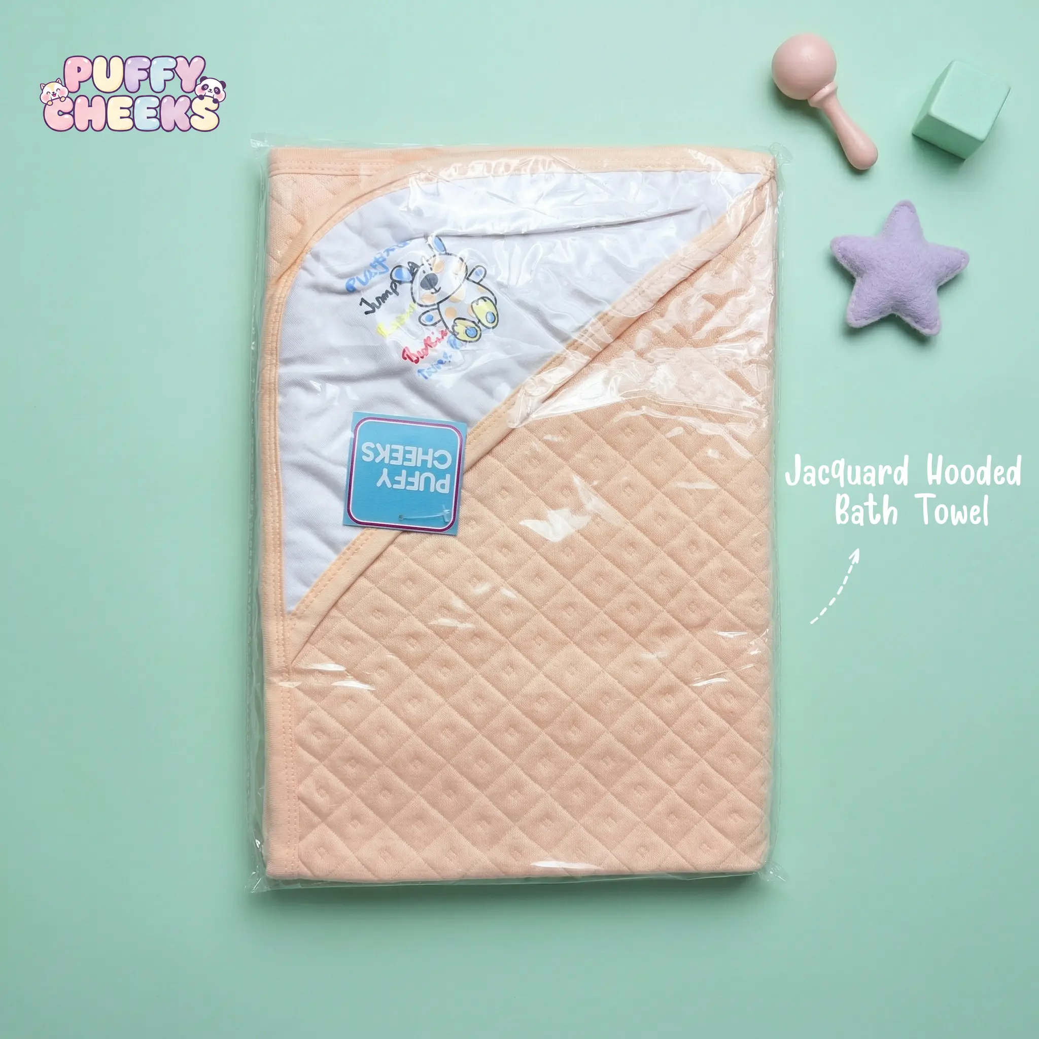 Puffy Cheeks soft peach-colored quilted diamond pattern jacquard hooded towel for newborns featuring a cartoon puppy graphic.