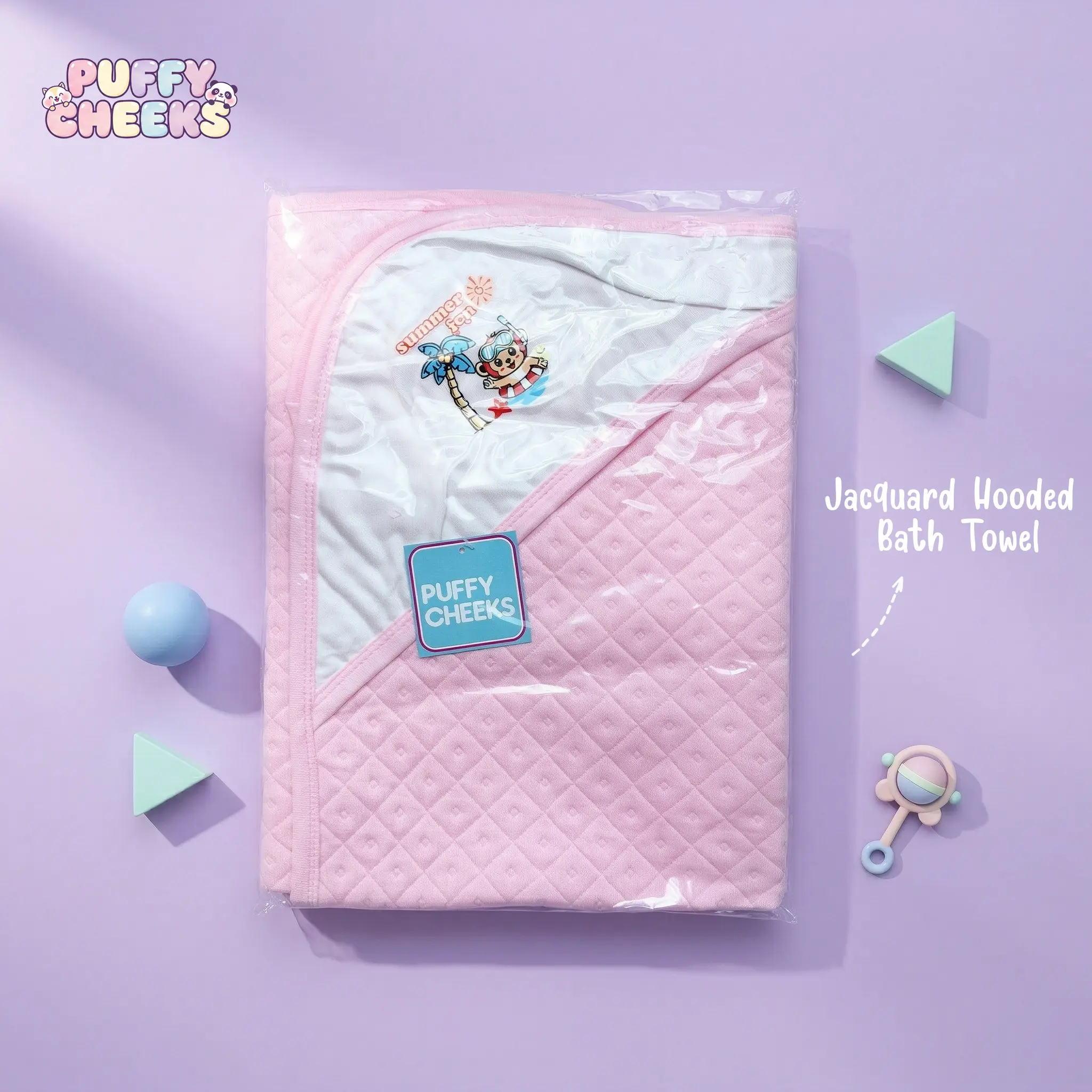 Puffy Cheeks pastel pink hooded baby bath towel with a summer monkey and palm tree embroidery detail on the corner hood.