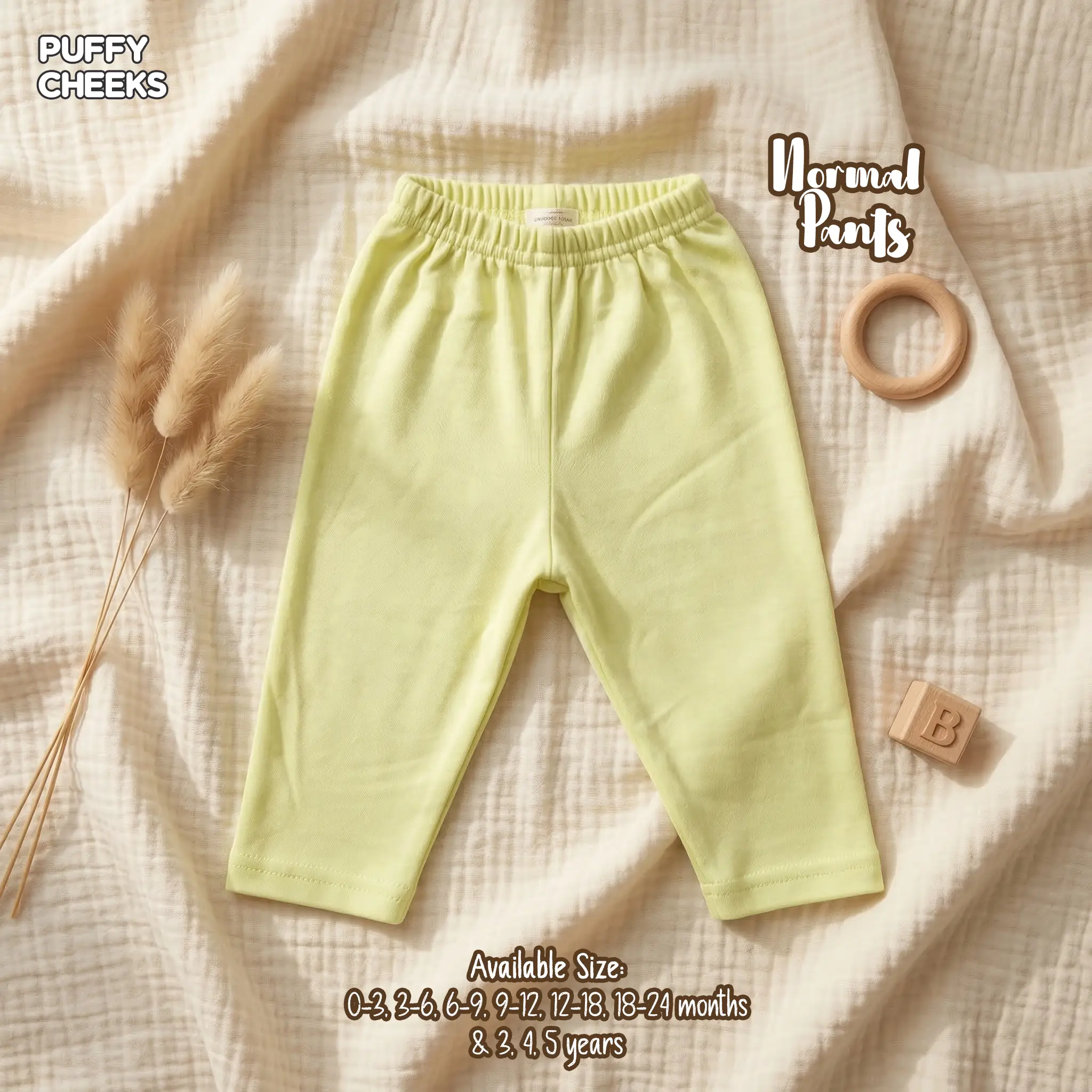 puffy-cheeks-infant-pants-pastel-yellow.webp